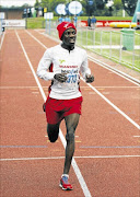 RECORD: Stephen Mokoka led the day of records when he won the  BestMed Tuks half marathon in Pretoria on Sunday. Photo: Dominic Barnardt / Gallo Images.