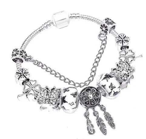 Bracelet DIY Attrape-rêves Argenté avec cristal, cœur d'amour, patte de chat et perles. Créez votre bijou unique.