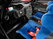 The race-ready interior includes carbon-fibre seats and a roll cage integrated into the bodywork.