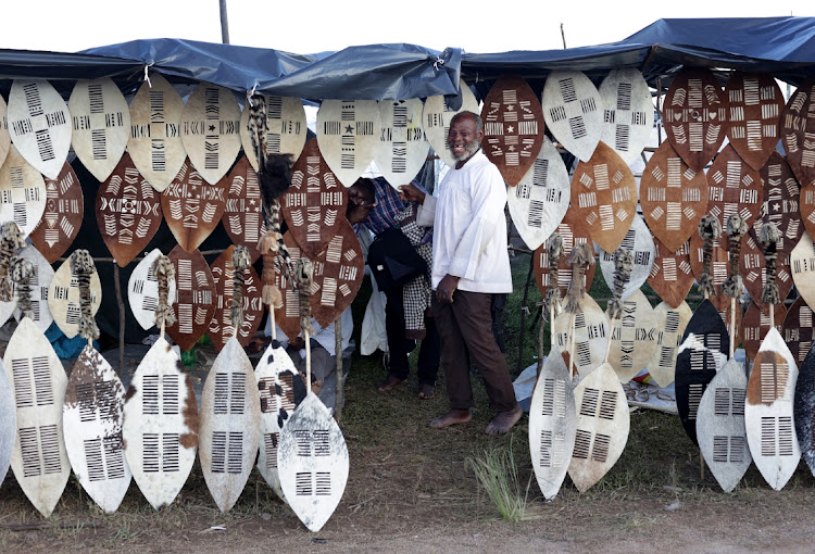 Julius Ntuli sell his traditional shields where thousands of the Ebuhleni faction of the Nazareth Baptist Church members are gathered for their annual pilgrimage.