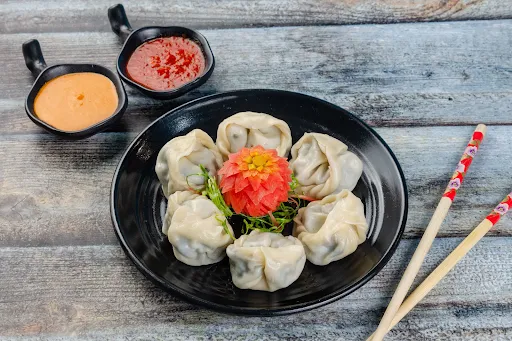 Chicken Butter Garlic Steamed Momos [6 Pieces]