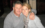 Murder accused Jason Rohde, left,  and his wife,  Susan, whom he is alleged to have strangled while they were attending a  company conference. 