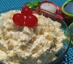 Pina Colada Salad was pinched from <a href="http://77easyrecipes.com/pina-colada-salad/" target="_blank">77easyrecipes.com.</a>