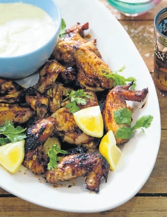 Sticky chicken wings with blue cheese.