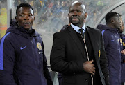 Kaizer Chiefs' head coach Steve Komphela (R) and his assistant John Paintsil (L) before the Absa Premiership match against Polokwane City at New Peter Mokaba Stadium on May 13, 2017 in Polokwane, South Africa.