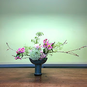 Japanese asymmetrical flower arrangements are as much about the blooms and branches as they are about the beauty of negative space.