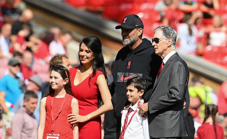 Liverpool manager Jurgen Klopp with owner John Henry and wife Linda Pizzuti Henry prior to the Premier League match against AFC Bournemouth at Anfield on August 27 2022.