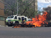 Protesters in a stand off with police at the corner of Bosman  and Struben streets in Pretoria on 2 November 2016.