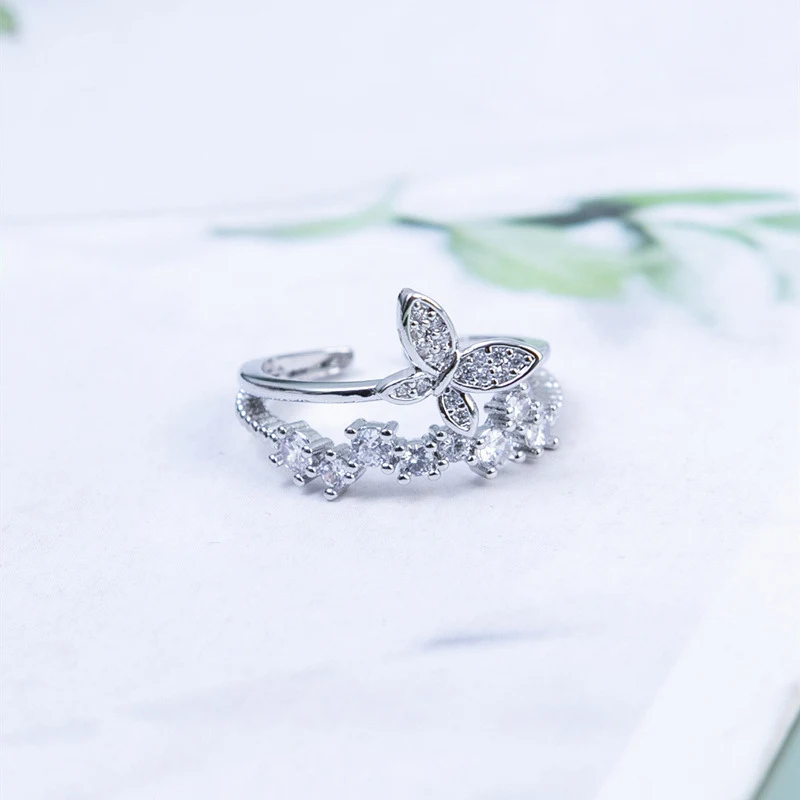 Title 5, Dubbele vlinder dames ring van koper met diaman...
