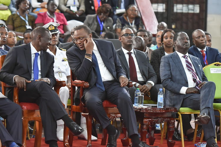 Deputy President William Ruto, President Uhuru Kenyatta and ODM Raila Odinga during the National Anti-Corruption Conference at Bomas on January 25, 2019.