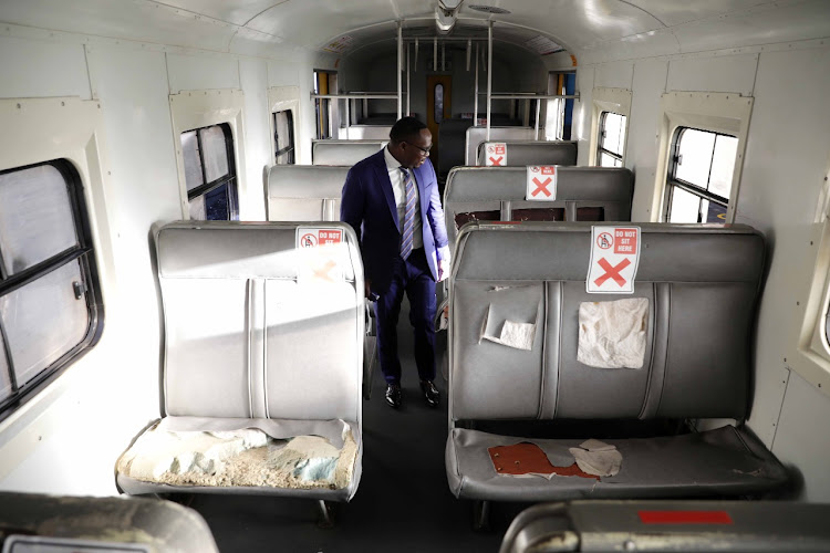 Western Cape transport MEC Bonginkosi Madikizela in a vandalised carriage at Cape Town station on July 1 2020.