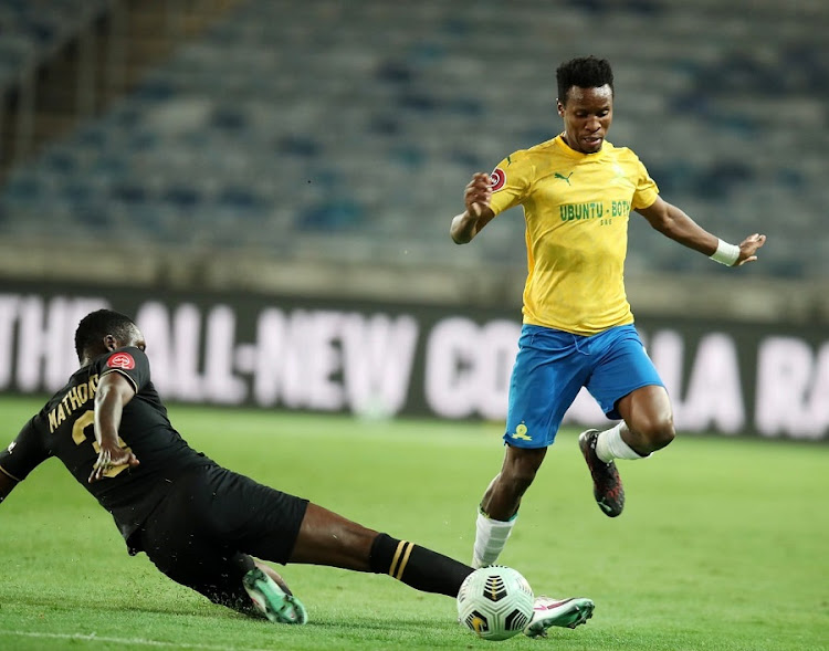 Mamelodi Sundowns' Themba Zwane skips the challenge of Eric Mathoho Kaizer Chiefs in the Absa Premiership match at Orlando Stadium on August 27, 2020.