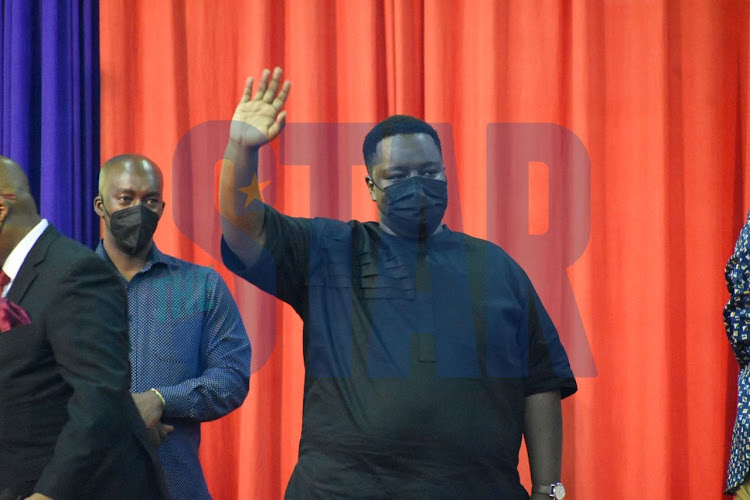 Agnes Kagure's son waves at the crowd during the official launch her campaign at Kasarani Indoor Arena on January 7, 2022.