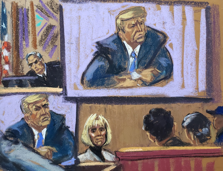 US District Judge Lewis Kaplan and former Elle magazine advice columnist E. Jean Carroll watch as Joe Tacopina, lawyer of former US President Donald Trump, makes closing arguments during a civil trial where Carroll accuses Trump of raping her in a department store dressing room in the mid-1990s, and of defamation, in New York, US, May 8, 2023 in this courtroom sketch.