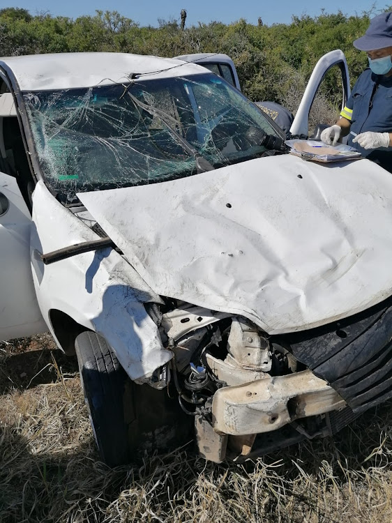 Three suspects were arrested after a traffic officer unknowingly foiled their alleged plans to hijack a truck on the N2 on Friday.