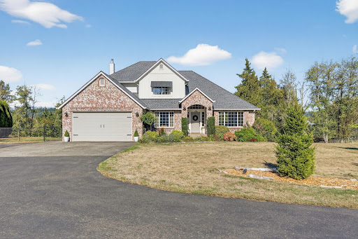 Luxury property for sale in Ridgefield (United States) - Brick house white trim, two-car garage