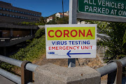 A coronavirus testing unit sign outside Groote Schuur hospital in Cape Town.