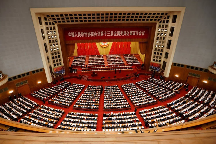 Chinese leaders and delegates attend the opening session of the Chinese People's Political Consultative Conference (CPPCC) at the Great Hall of the People in Beijing.