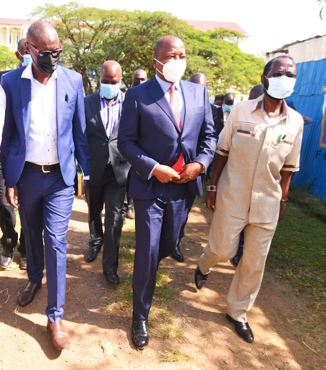 Health CS Mutahi Kagwe (centre) and Governor Anyan'g Nyong'o at Jaramogi Oginga Odinga Teaching and Referral Hospital in Kisumu on Wednesday, March 3.