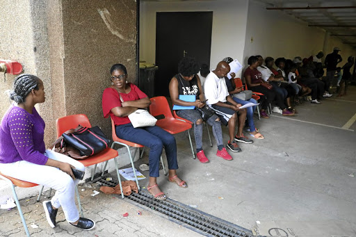 Parents queue at the department of education offices in Ekurhuleni for placement of pupils. /ANTONIO MUCHAVE