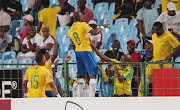 Mamelodi Sundowns captain Hlompho Kekana celebrates with the fans after scoring the winning goal with a stupendous free kick. 