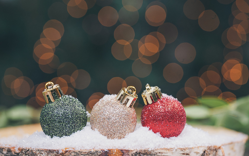 Balls decorate the pine tree