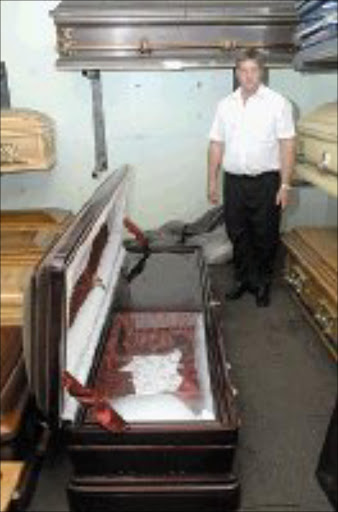 VERY HEAVY: Top-of-the-range coffin, Phumlani. Pic. Mabuti Kali. 20/04/07. © Sowetan.