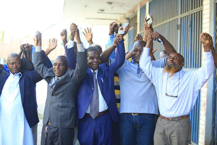 A section of Mijikenda elders who work at the Mombasa port outside Red Brick Hotel in Mombasa on Saturday.