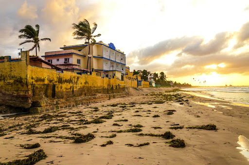 Cuba-Beach-Landscape-at-Dusk-with-Building_01.jpg - A beach scene in Cuba.