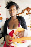 ORDEAL: Angelina Hlabangwane claims nurse ignored her. 13/05/2005. Pic. Alfred Moselakgomo. © Sowetan.