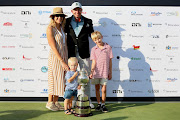 Dean Burmester celebrates winning the Investec SA Open with his family at Blair Atholl on Sunday. 