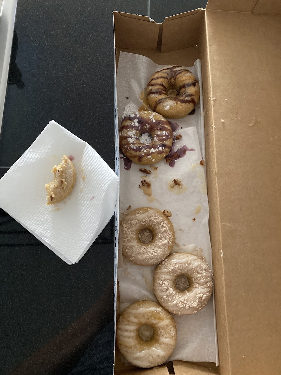 Top to bottom: Blueberry, Reese, maple pecan, two “sandy beaches” and a honey glazed.