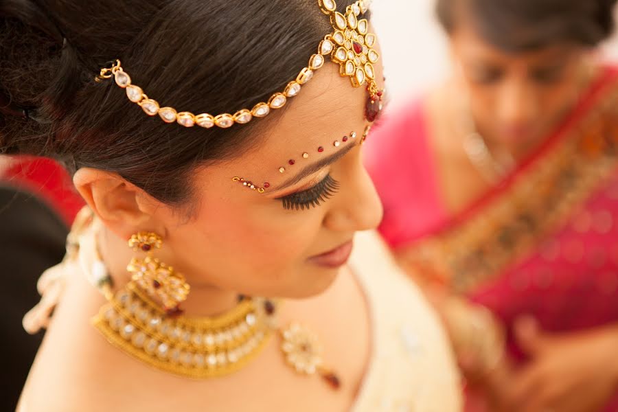 結婚式の写真家Kishen Borkhatria (indianweddingph)。2014 1月24日の写真