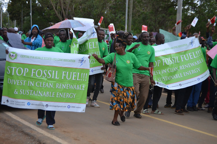 Residents from the coal rich Mui basin in a procession in Kitui town as they proceeded to the Kitui County headquarters to present a petition in opposition to coal mini in their area.