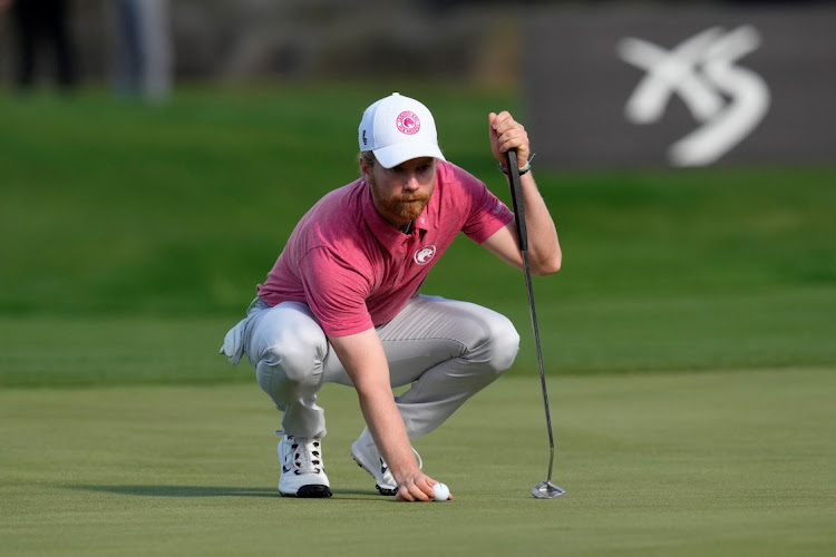 Kieran Vincent lines up his putt on the eighth green during the second round of the LIV Golf Las Vegas tournament at Las Vegas Country Club last month.