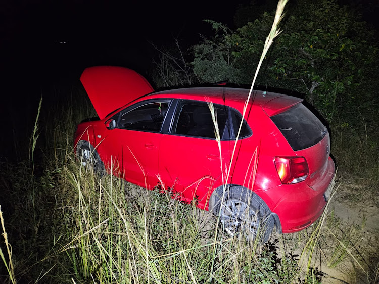 One of the hijacked vehicles, abandoned by the suspects.