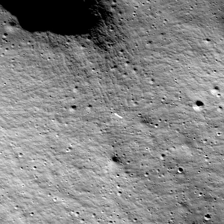 The Intuitive Machines IM-1 Nova-C lunar lander, known as Odysseus, is seen next to the arrow added to the image by researchers after it touched down on the moon on February 22 2024.