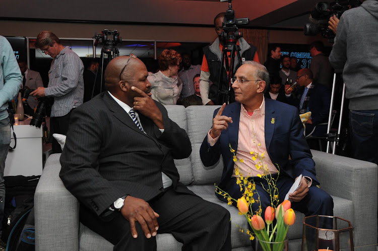 A file photo of Cricket South Africa board chairperson Chris Nenzani and former CEO Haroon Lorgat in a discussion during the T20 launch at the Wanderers Stadium in Johannesburg on May 31 2017.