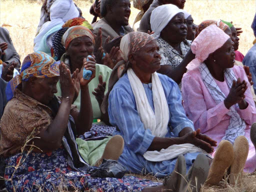 Farmers at a meeting in Marumi factory, Kigumo, on Tuesday.