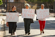 Protesters against child abuse at a court case. File photo. 