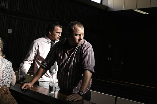 FILMED: Willem Oosthuizen, left, and Theo Jackson appeared at the high court in Middelburg for sentencing Picture: Alaister Russell