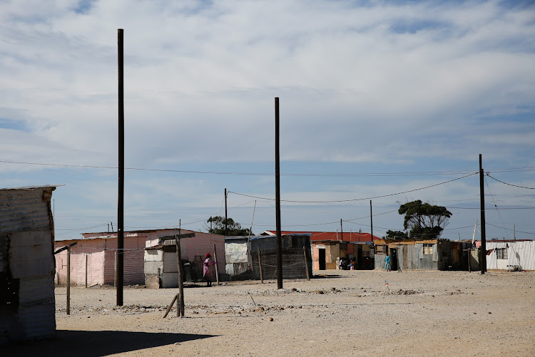 Electric poles erected for a project in Kwazakhele which has been halted since the lockdown