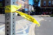 Police tape is pictured at a crime scene after a deadly mass shooting on South Street in Philadelphia, Pennsylvania, US on June 5, 2022.  