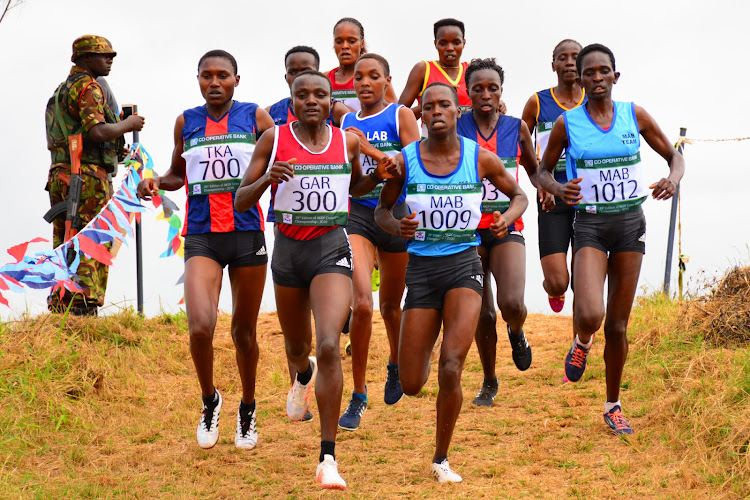 Joyceline Jepkosgey and Dorcas Kimeli lead the pack in 10km during the 39th edition of KDF cross country championships at Thika Barracks on January 24,2020