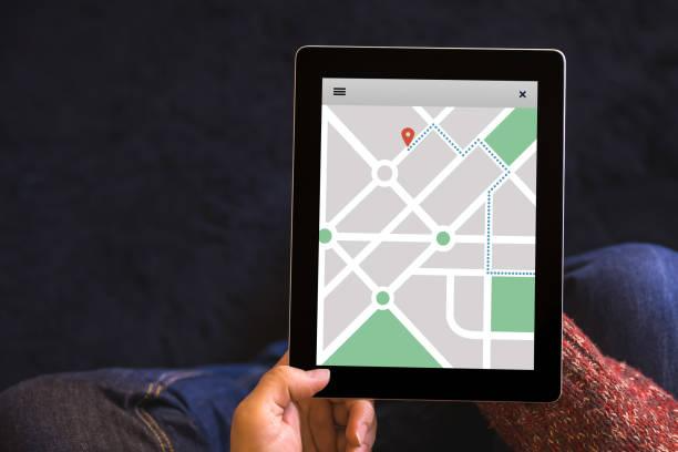 https://media.istockphoto.com/id/956325502/photo/hands-holding-tablet-with-location-tracker-concept-on-screen-gps-map-navigation-app.jpg?b=1&s=612x612&w=0&k=20&c=pUrEkvy2habkksO9NT8N_g5in535WVR_YoRo95PPxyA=