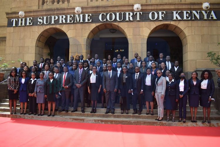 64 newly sworn in magistrates take a photo op at Supreme Court on January 11, 2021.