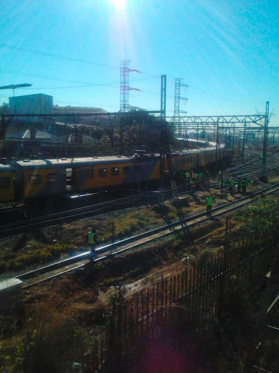 Caption: Two trains collided in Selby, Johannesburg, leaving about 100 people injured on Tuesday.