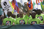 Queen Latifah leading the Keep the Promise  march in Durban ahead of the Aids conference flanked by Health MEC Sibongiseni Dlomo and Durban Mayor James Nxumalo.