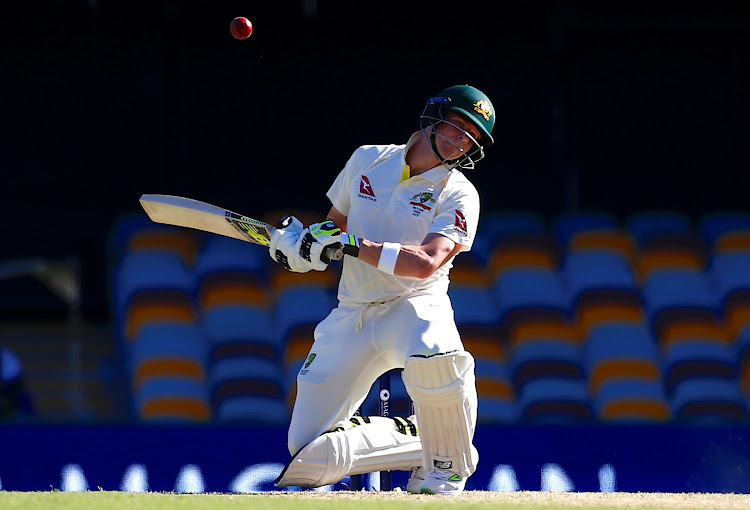 Australia's captain Steve Smith avoids a bouncer bowled by England's Stuart Broad during the second day of the first Ashes cricket test match.