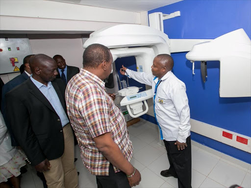 President Uhuru Kenyatta when he commissioned medical equipment at Kericho county hospital on Friday, December 9. /PSCU